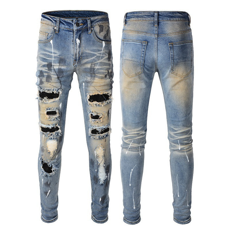 Men's Blue Jeans with Black Patches, Distressed Paint, and Ripped Details (523-6523)